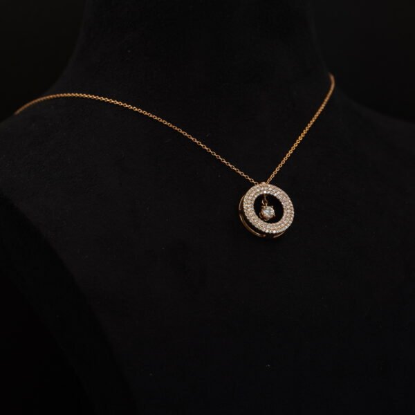 Pendentif Or Rose diamants et diamant mobile joaillerie Cannes